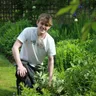 Freddy Trounce, The Greensman, working in a client's garden